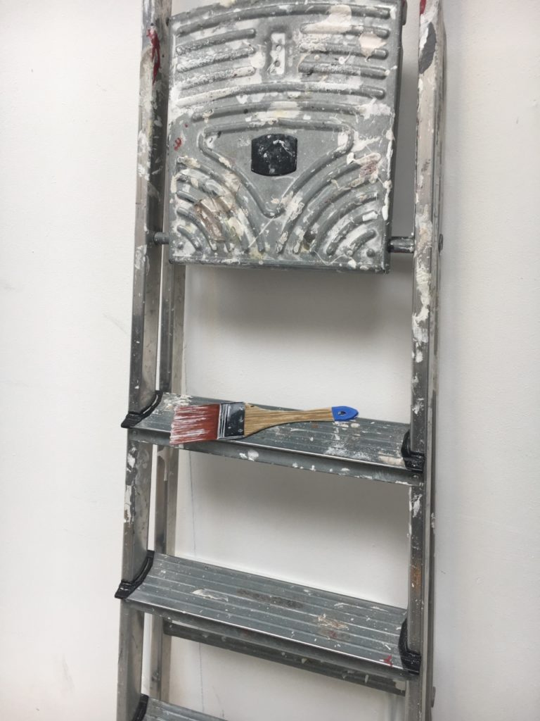 Paintbrush on a ladder